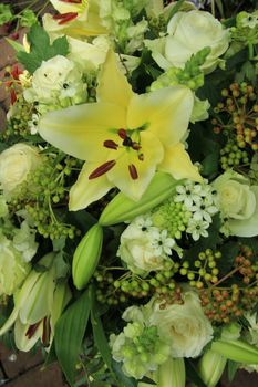 yellow tiger lily in a bridal arrangement