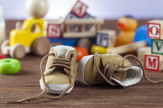 Children's World toy on a wooden background. Studio shot]