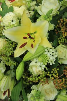 yellow tiger lily in a bridal arrangement