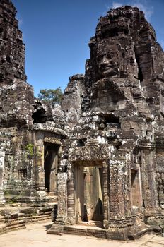 Faces of ancient Bayon Temple At Angkor Wat, Siem Reap, Cambodia