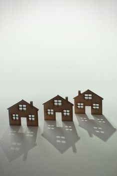 Three small houses in a row with space for text