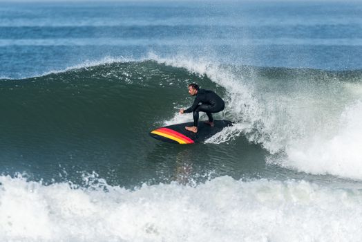 Stand up paddle surfer on the atlantic ocean.