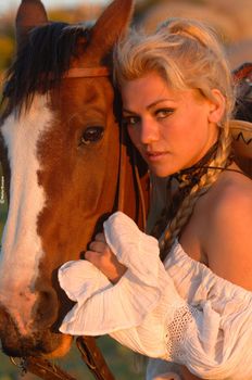 Young girl with big horse