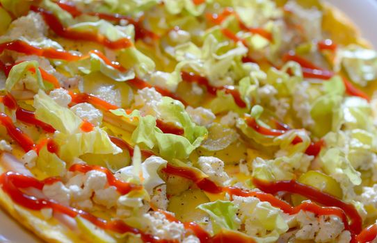 Ham and cheese omelet with vegetables