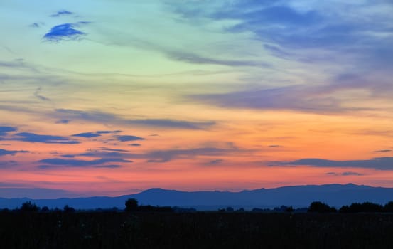 Sunset in the Carpathian mountains from countryside