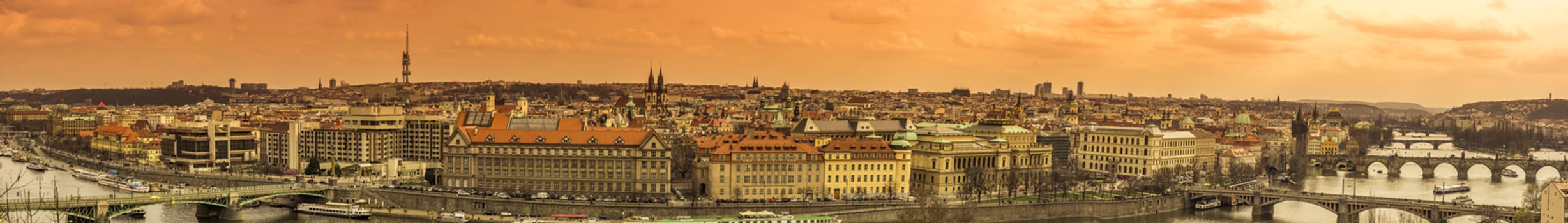 Panoramic city view with the capital of Czech Republic, Prague, with details of the  historical buildings and the many stone bridges