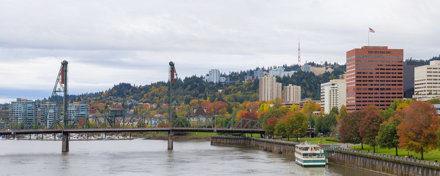 Portland Oregon city downtown waterfront park by Hawthorne Bridge in fall season panorama
