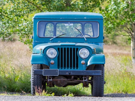 REYKJAVIK, ICELAND - July 29, 2016: Selective focus on an abandoned Willys Jeep on Iceland. Willys Jeeps were made by Willys-Overland Motors from 1947 to 1965.