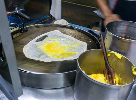 Roti pile in street food at thailand.