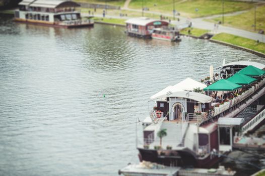 motor boat floats on the river in summer time