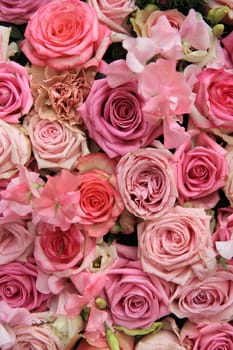 Lathyrus and roses in a pink wedding arrangement