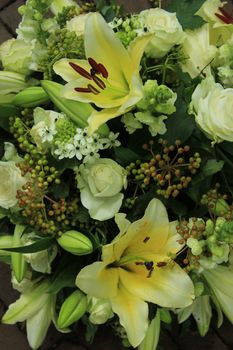 yellow tiger lily in a bridal arrangement