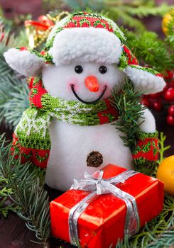 The photograph depicts Christmas background with toys