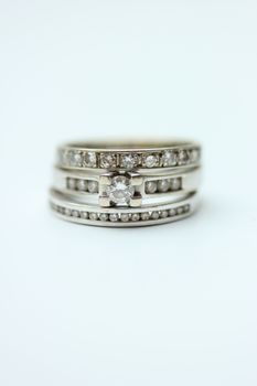 Diamond ring stack: engagement ring, wedding band and anniversary band