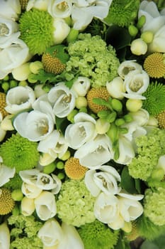 White roses, mixed with green in a bridal bouquet