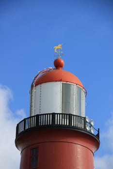 A small vintage lighthouse at the North Sea Coast