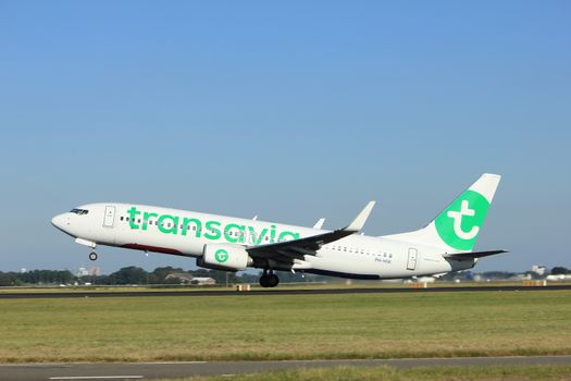 Amsterdam, the Netherlands  - August, 18th 2016: PH-HSK Transavia Boeing 737-8K2,
taking off from Polderbaan Runway Amsterdam Airport Schiphol