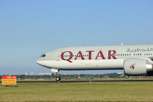 Amsterdam, the Netherlands  - August, 18th 2016: A7-BAY Qatar Airways Boeing 777,
taking off from Polderbaan Runway Amsterdam Airport Schiphol