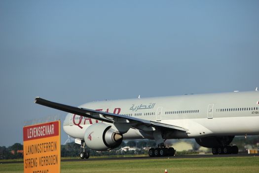 Amsterdam, the Netherlands  - August, 18th 2016: A7-BAY Qatar Airways Boeing 777,
taking off from Polderbaan Runway Amsterdam Airport Schiphol