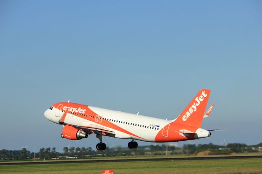 Amsterdam, the Netherlands  - August, 18th 2016: G-EZPA easyJet Airbus A320-214,
taking off from Polderbaan Runway Amsterdam Airport Schiphol