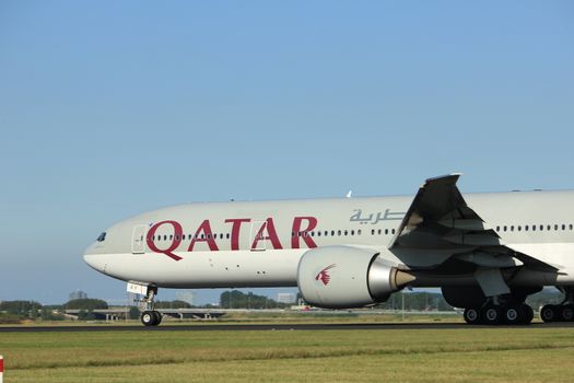 Amsterdam, the Netherlands  - August, 18th 2016: A7-BAY Qatar Airways Boeing 777,
taking off from Polderbaan Runway Amsterdam Airport Schiphol