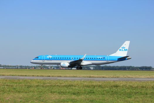 Amsterdam, the Netherlands  - August, 18th 2016: PH-EZU KLM Cityhopper Embraer ERJ-190STD 
taking off from Polderbaan Runway Amsterdam Airport Schiphol