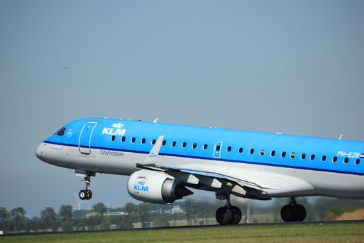 Amsterdam, the Netherlands  - August, 18th 2016: PH-EZR KLM Cityhopper Embraer ERJ-190STD 
taking off from Polderbaan Runway Amsterdam Airport Schiphol