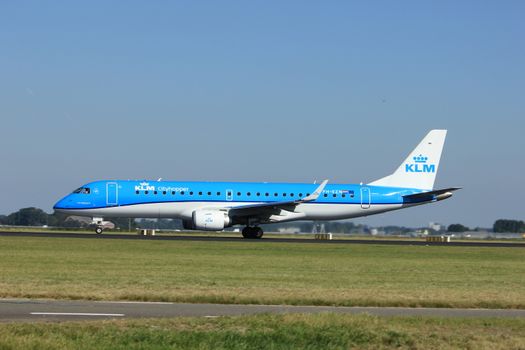 Amsterdam, the Netherlands  - August, 18th 2016: PH-EZN KLM Cityhopper Embraer ERJ-190STD 
taking off from Polderbaan Runway Amsterdam Airport Schiphol