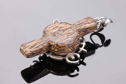Handmade jewelry on a black glass studio background