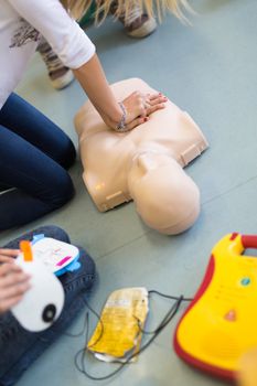 First aid cardiopulmonary resuscitation course using automated external defibrillator device, AED.