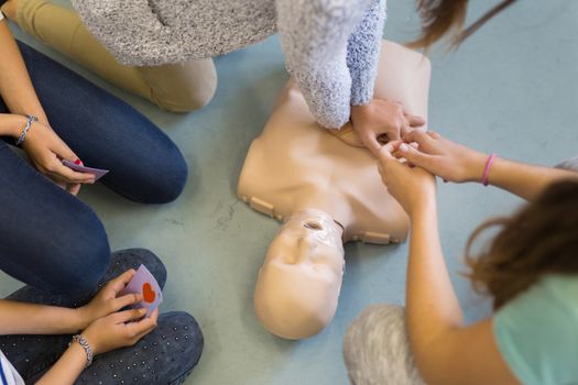 First aid cardiopulmonary resuscitation course using automated external defibrillator device, AED.
