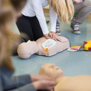 First aid cardiopulmonary resuscitation course using automated external defibrillator device, AED.