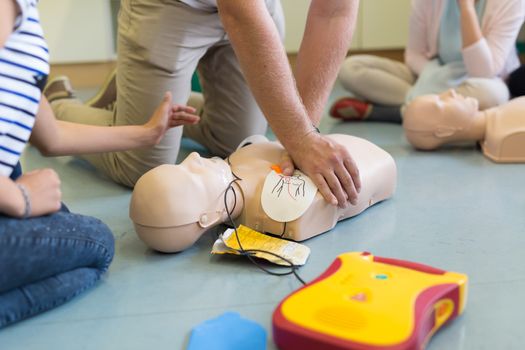 First aid cardiopulmonary resuscitation course using automated external defibrillator device, AED.