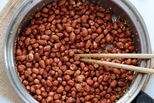 Vietnamese snack food, roasted peanut with red hot pepper, garlic, salt, make delicious eating