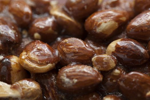 the whole almonds in caramel as background