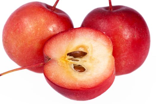 Red paradise apples isolated on white background, close up