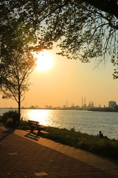 Skyline of an industrial area during sunset