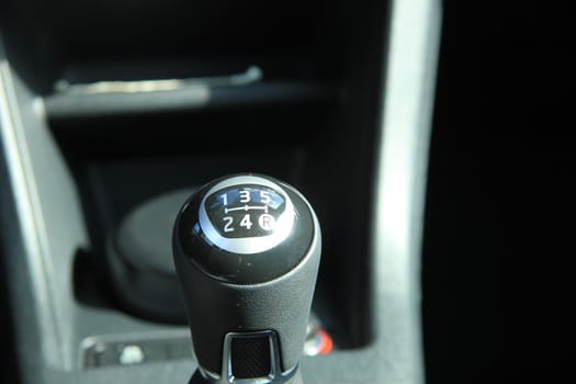 Manual transmission gear shift in a modern small car