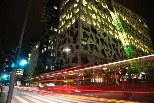 moving car with blur light through Dronning Eufemias gate street in Oslo at night