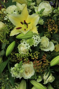 yellow tiger lily in a bridal arrangement