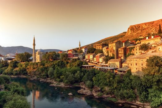 View of Neretva river and old city of Mostar old city by sunset, Bosnia and Herzegovina