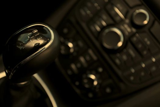 Details closeup of cockpit and dash, gearstick in modern car