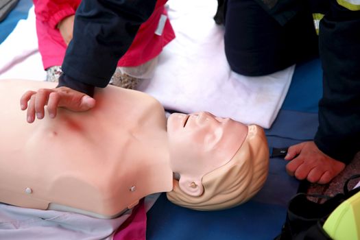 Details of practicing CPR chest compressioon on a dummy