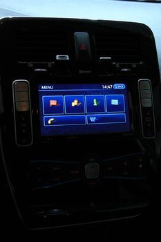 Digital dashboard of a modern car, showing all different functions