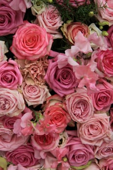 Pink roses in a bridal flower arrangement, centerpiece decorations