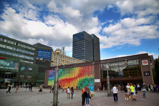 OSLO, NORWAY – AUGUST 18, 2016: People visit Oslo Central Station (Norwegian: Oslo sentralstasjon) is the main railway station in Oslo, Norway on August 18,2016.