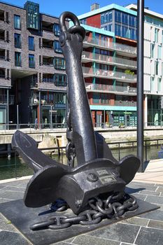 OSLO, NORWAY – AUGUST 17, 2016: Anchor on modern district on street Stranden, Bluchers Anker at Aker Brygge which was sunk in Oslofjord in 1940. in Oslo, Norway on August 17,2016.