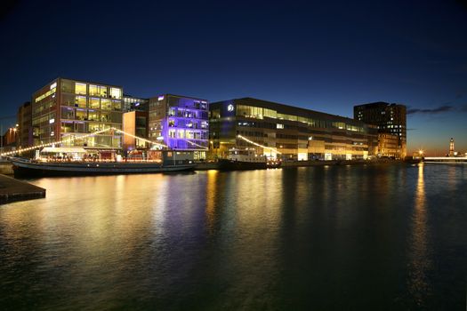 MALMO, SWEDEN - AUGUST 16, 2016: View of beautiful night scene and Malmo canals from Posthusplatsen in Malmo, Sweden on August 16, 2016.