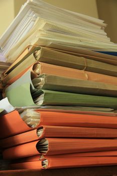 Stacked office files: pile of files in an office