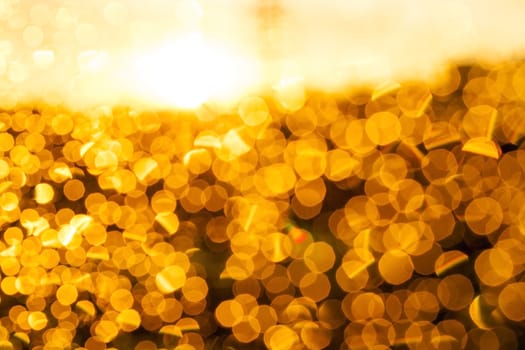 orange circles. Photo of water drops on glass at sunset, which formed bokeh, defocused